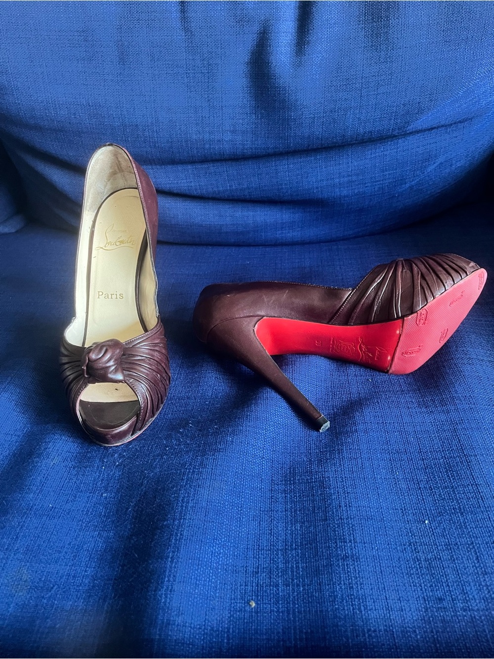 Christian Louboutin Burgundy Knotted Peep-Toe Pumps with Red Sole